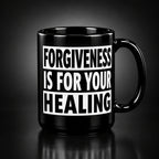 Black mug with motivational text on a white background